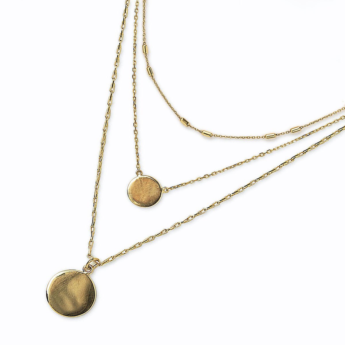 Gold vermeil triple-layered necklace with two round disc pendants, on a white background