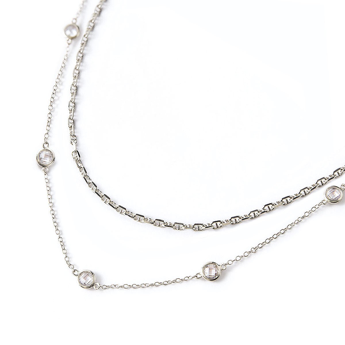 Sterling silver Marina chain and clear crystal station chain layered duo, on a white background