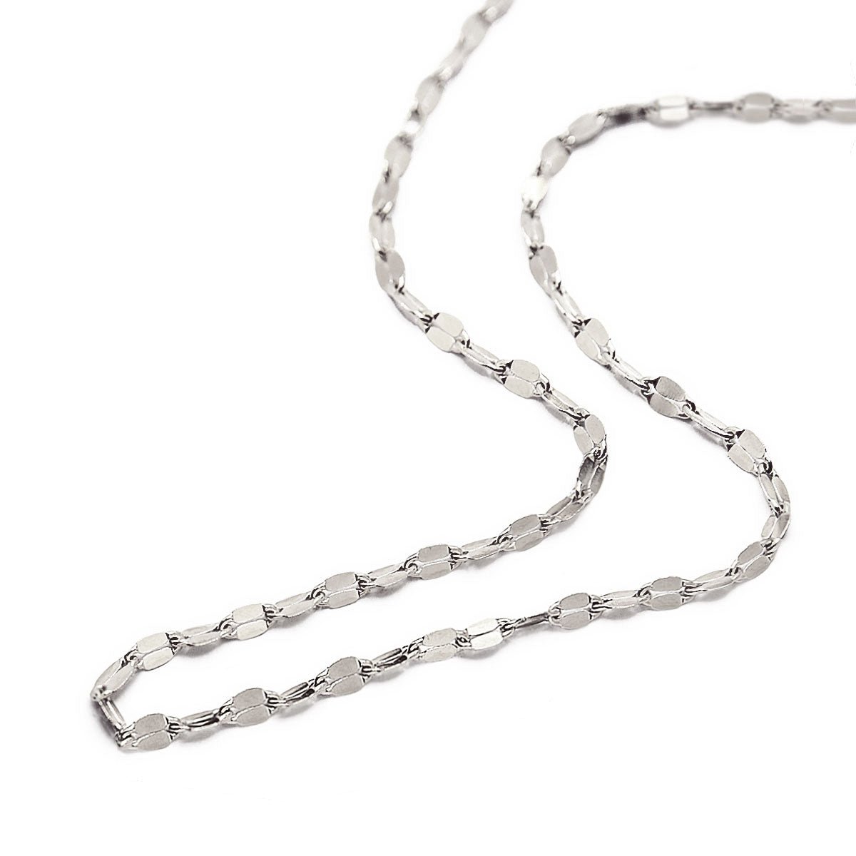 Sterling silver flat mirrored-link chain necklace coiled on a white background