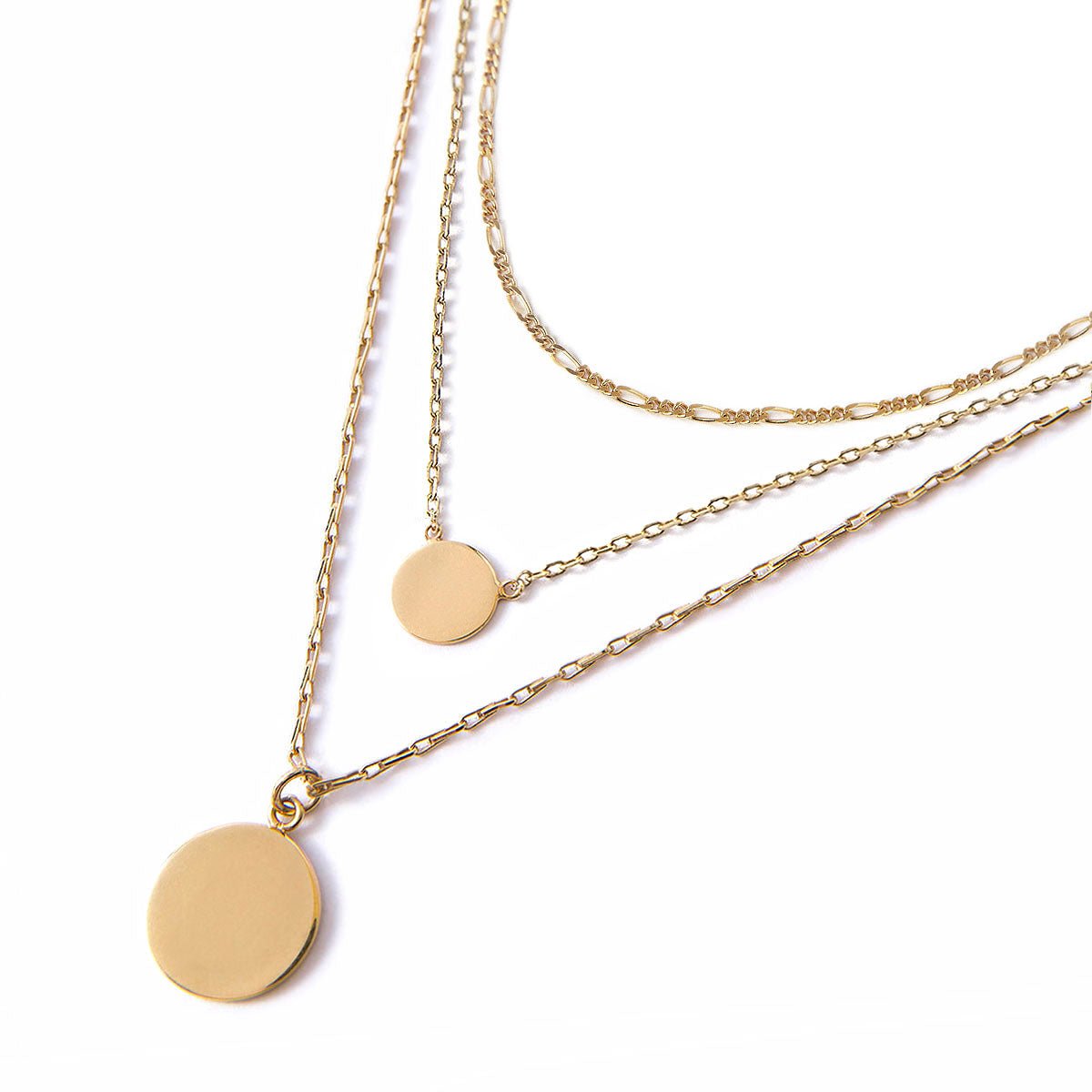 Gold vermeil Figaro disc trio necklace with three graduated discs and chains, on a white background