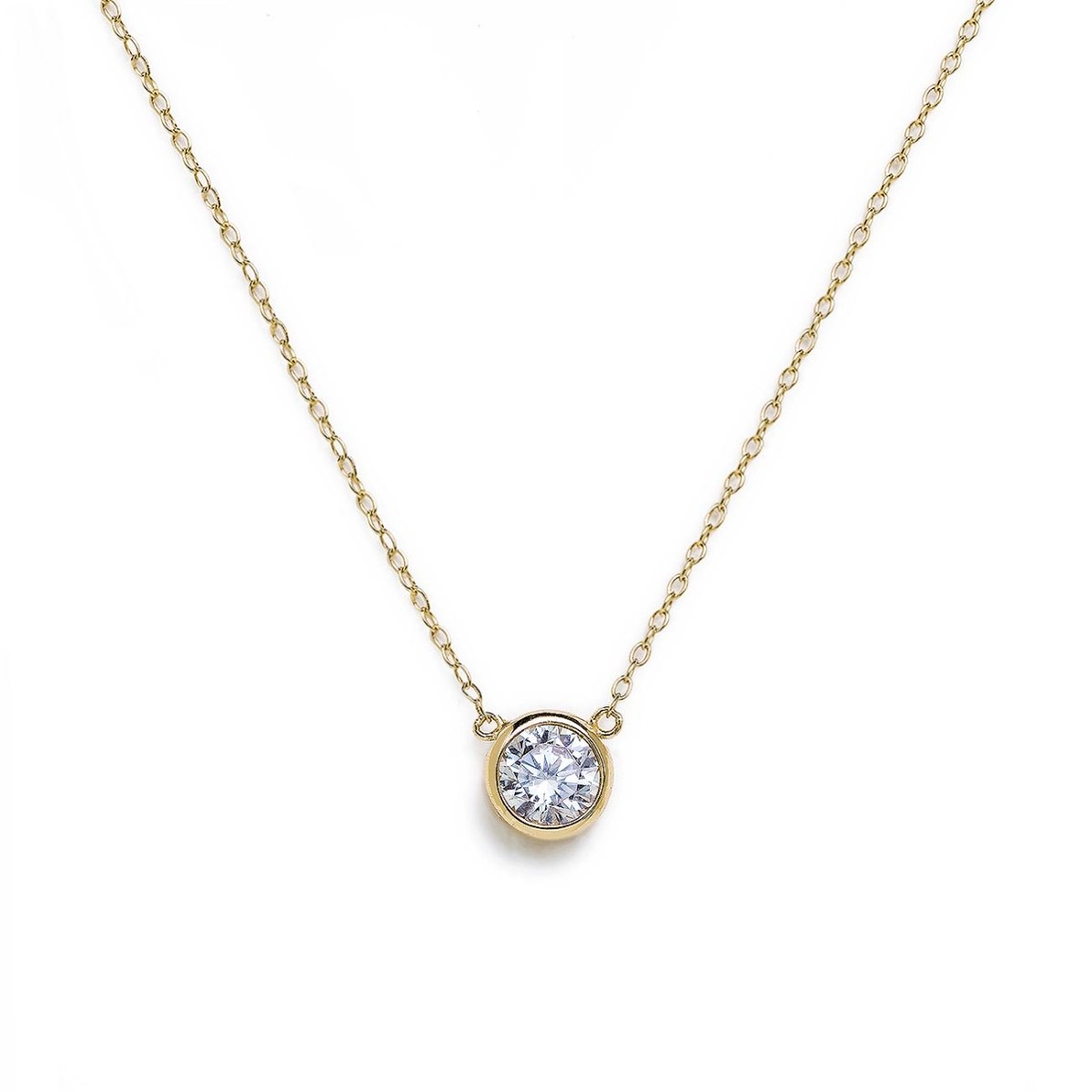 Gold vermeil solitaire necklace with a round bezel-set white zirconia, on a white background