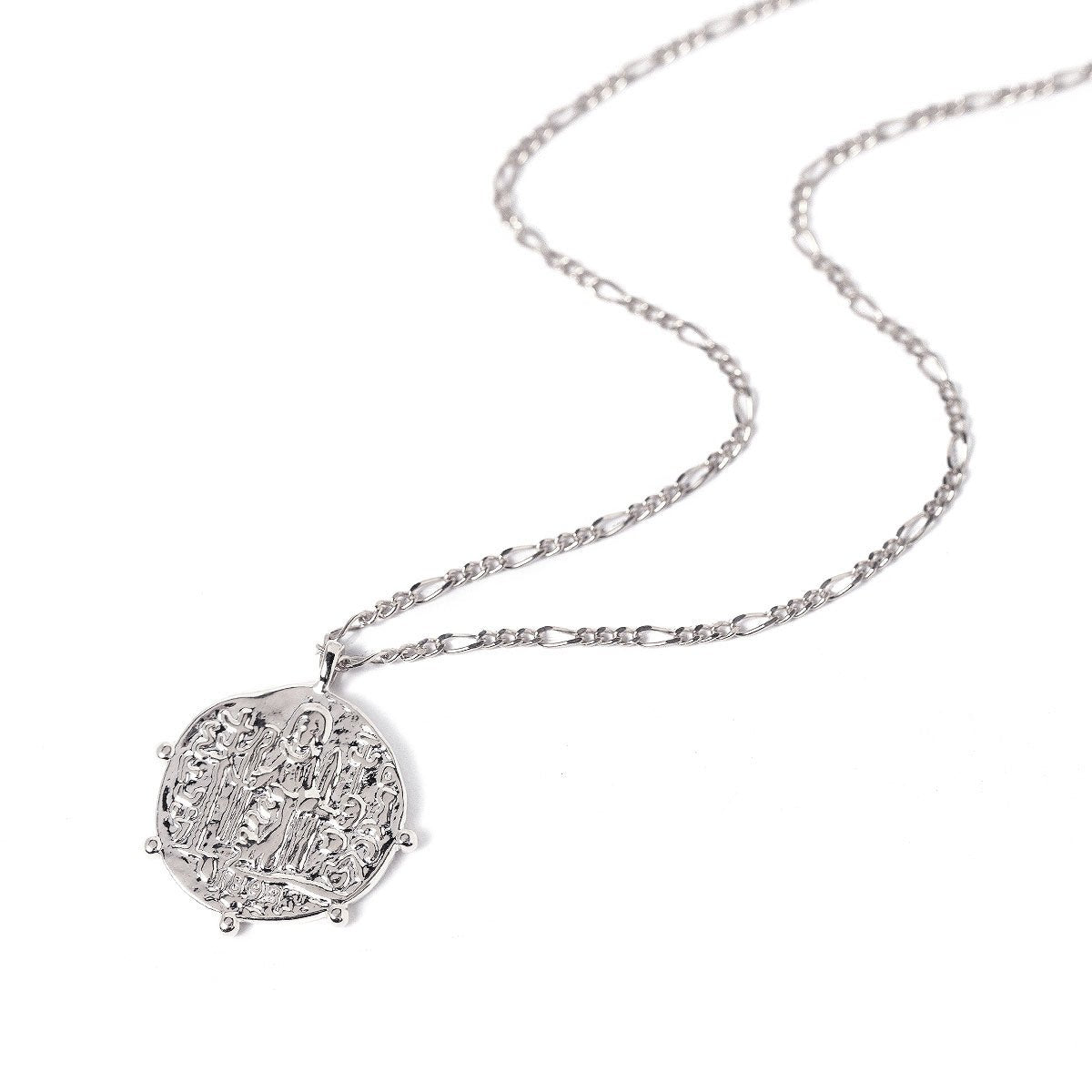 Sterling silver figaro chain necklace with an embossed Grecian coin pendant on a white background