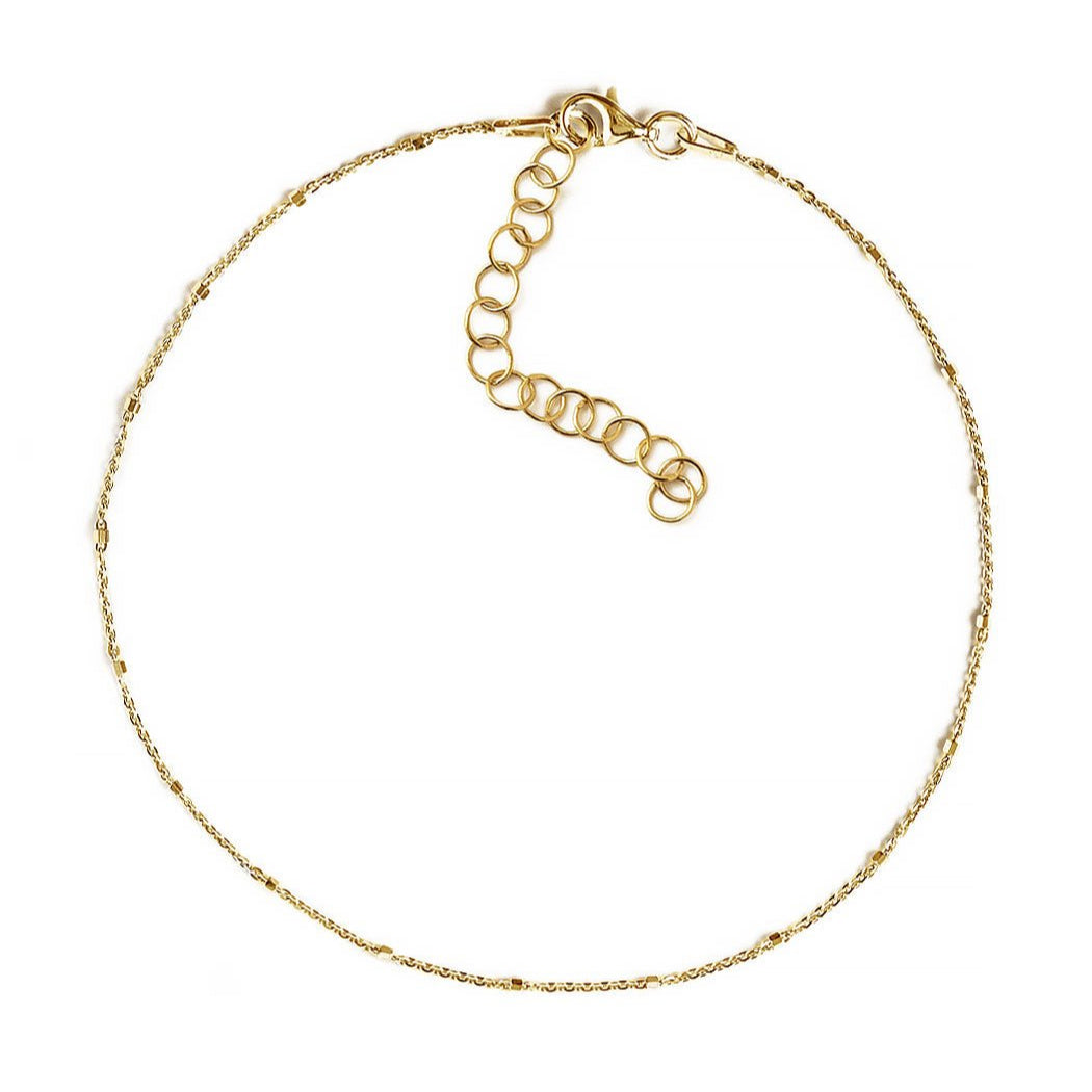 Gold vermeil faceted bead chain anklet with an extender and lobster clasp, on a white background