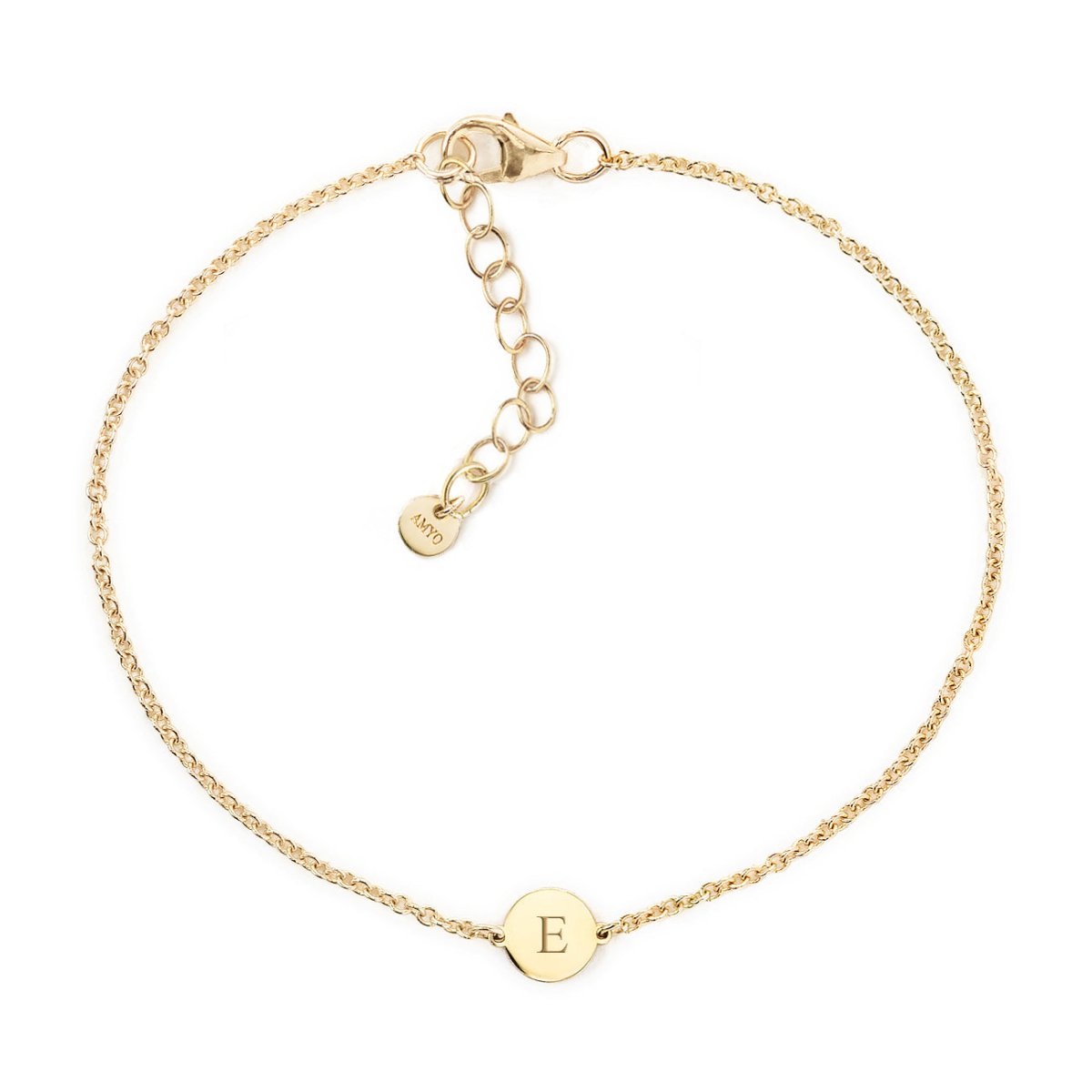 Gold vermeil thin chain bracelet with a small disc engraved with an initial, on a white background