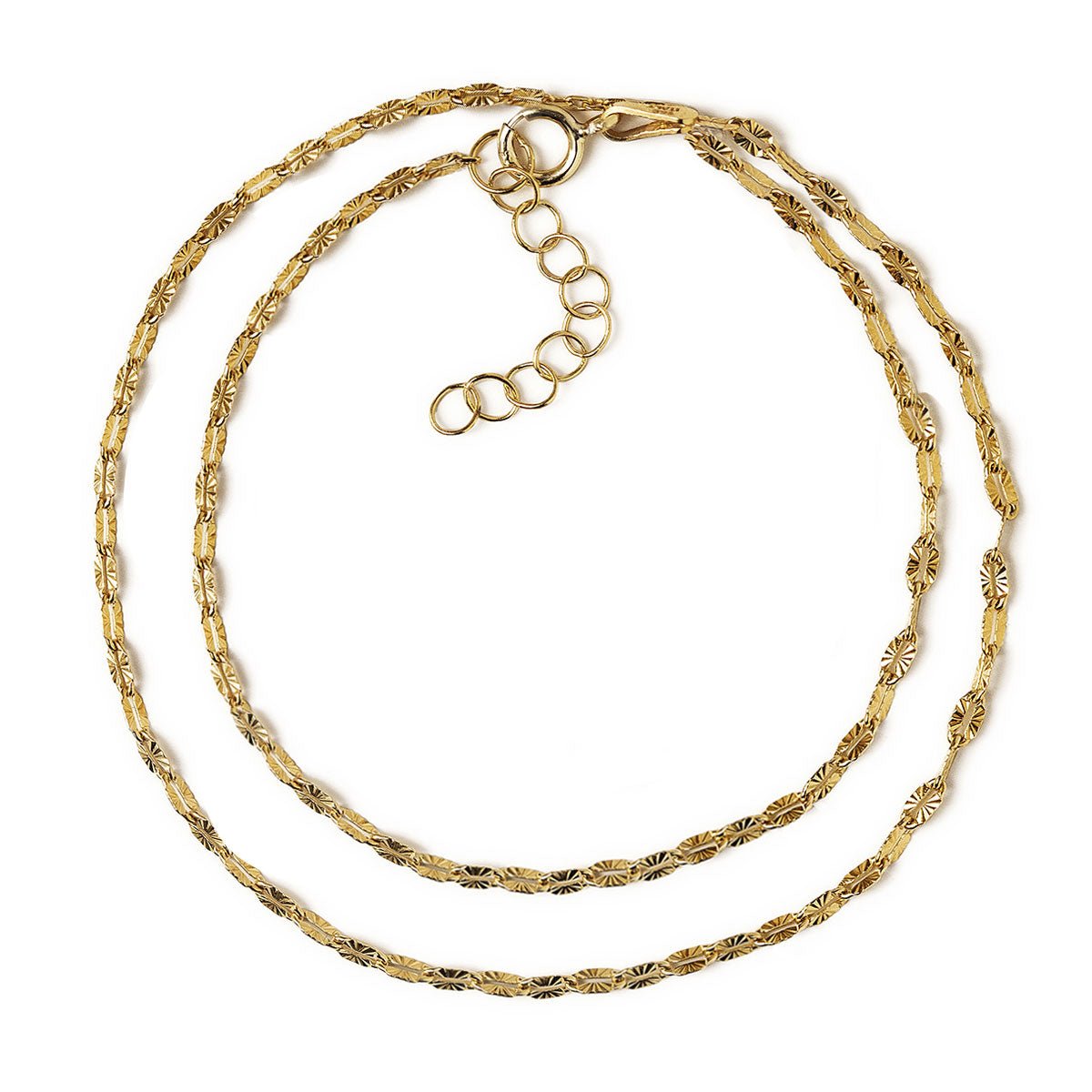 Gold vermeil diamond-cut lace chain wrap bracelet with an extender, on a white background