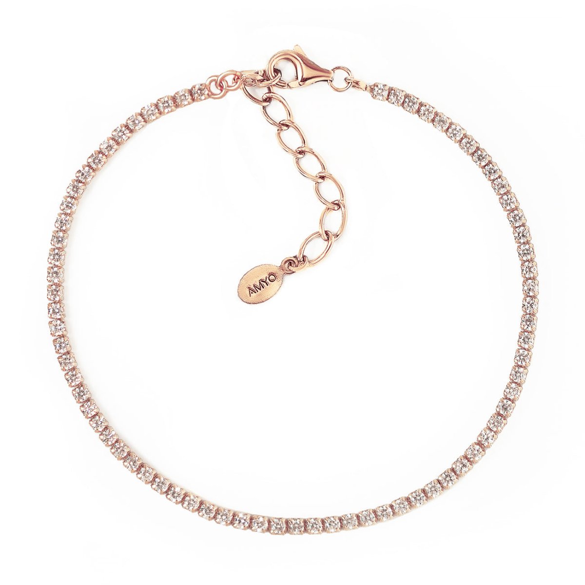 Rose gold vermeil thin tennis bracelet set with white zirconia, lobster clasp and chain extender, on a white background