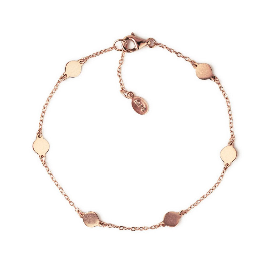 Rose gold vermeil round disc station bracelet with a lobster clasp, laid on a white background