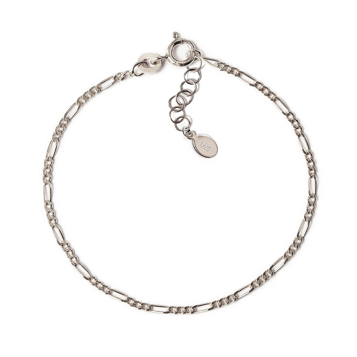 Sterling silver Figaro chain bracelet with a spring-ring clasp and oval logo tag, on a white background