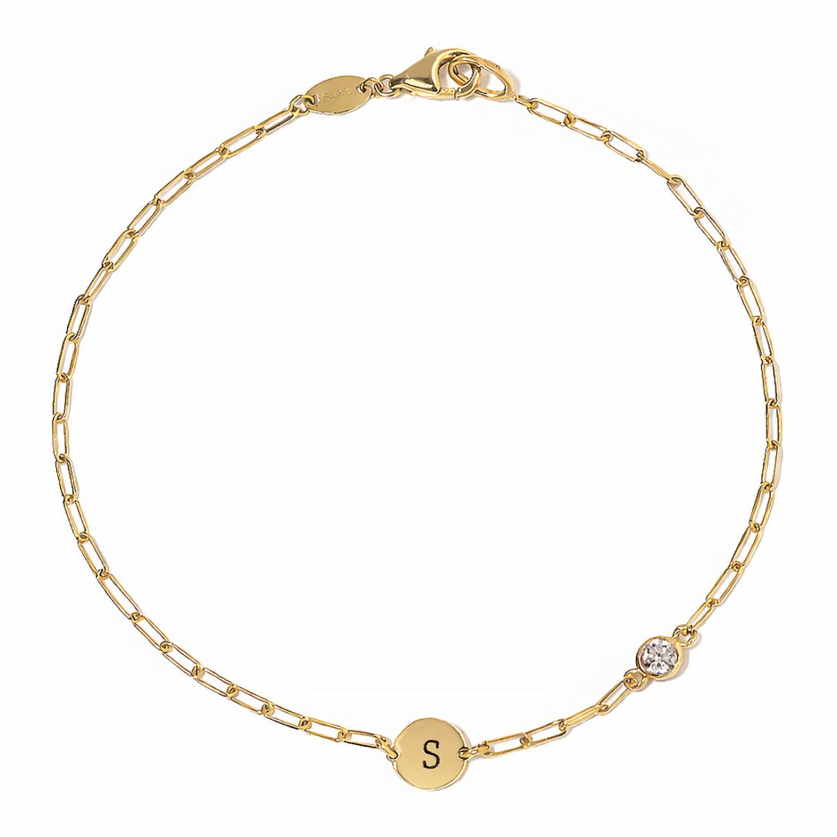 14K gold initial disc paperclip-chain bracelet with a moissanite stone, engraved with an initial, on a white background