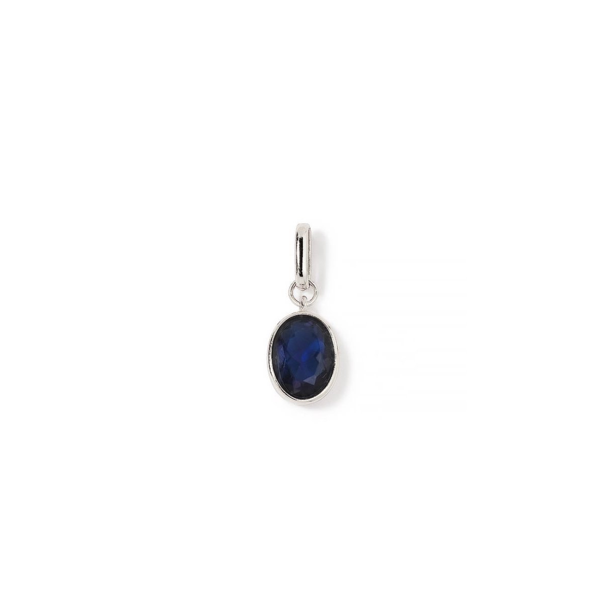 Sterling silver oval charm with a bezel-set blue sapphire stone, on a white background