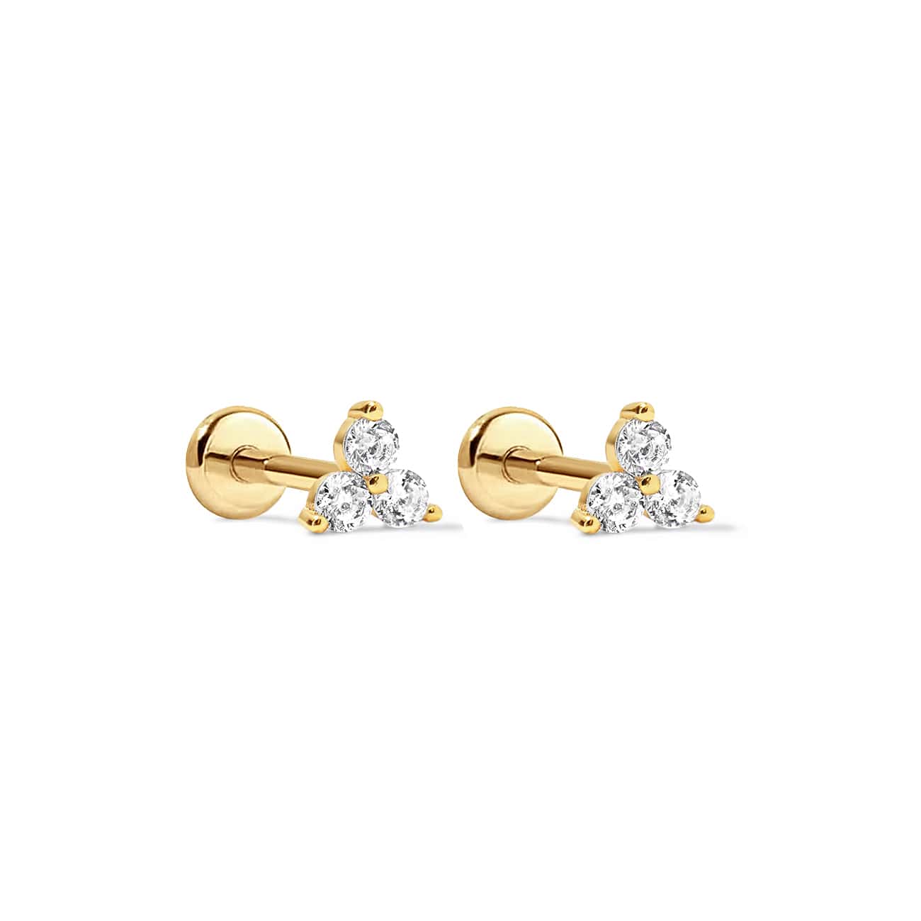Pair of gold vermeil flat back studs with three white zirconia stones each, on a white background