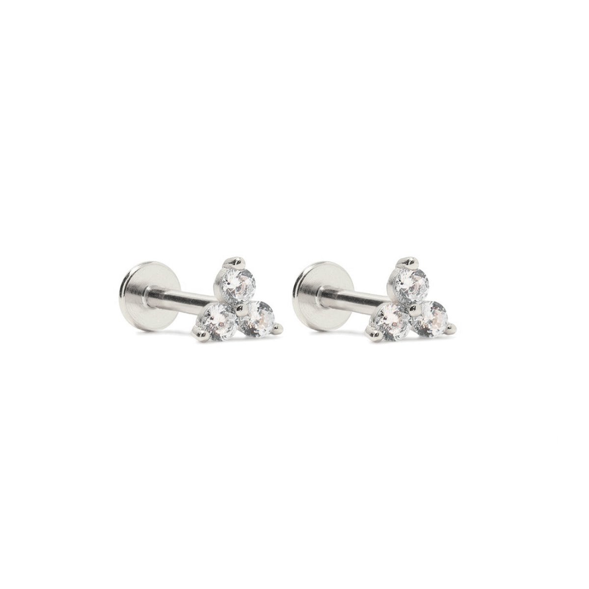 Pair of sterling silver flat back studs with trio white zirconia clusters, on a white background