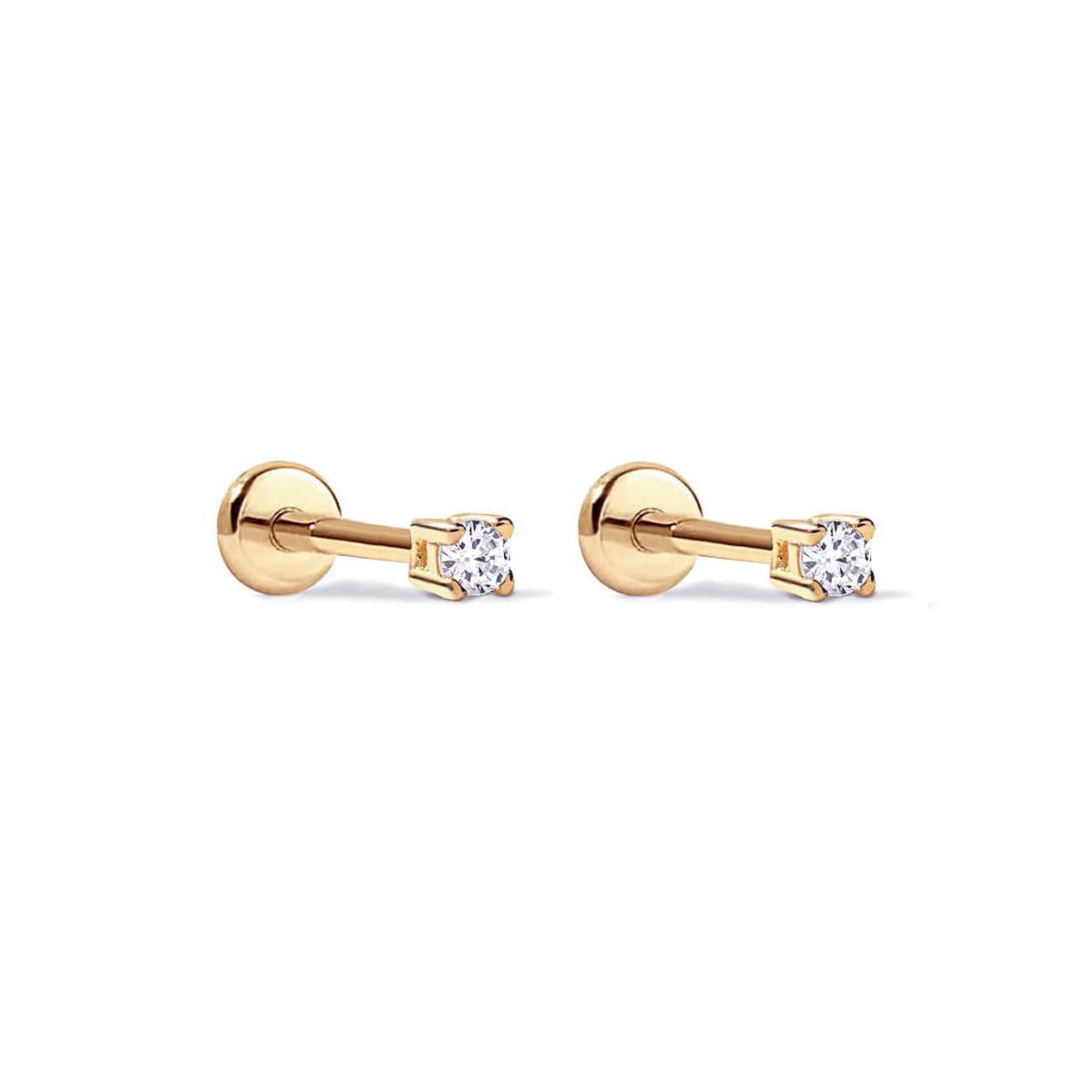 Pair of gold titanium flat back studs with clear zirconia stones, on a white background