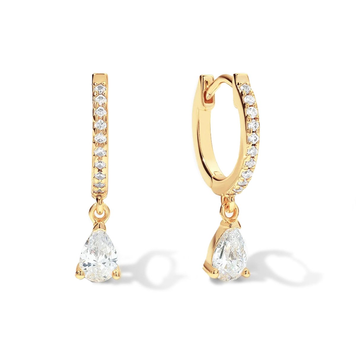 Gold vermeil pavé huggie hoops with pear-shaped clear zirconia drops, on a white background