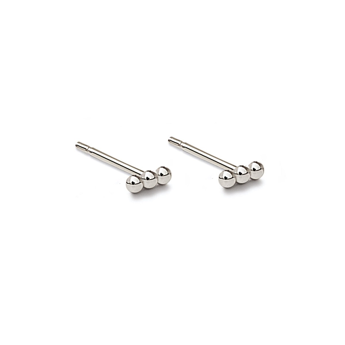 Pair of sterling silver tiny bead bar studs with three-bead clusters, on a white background