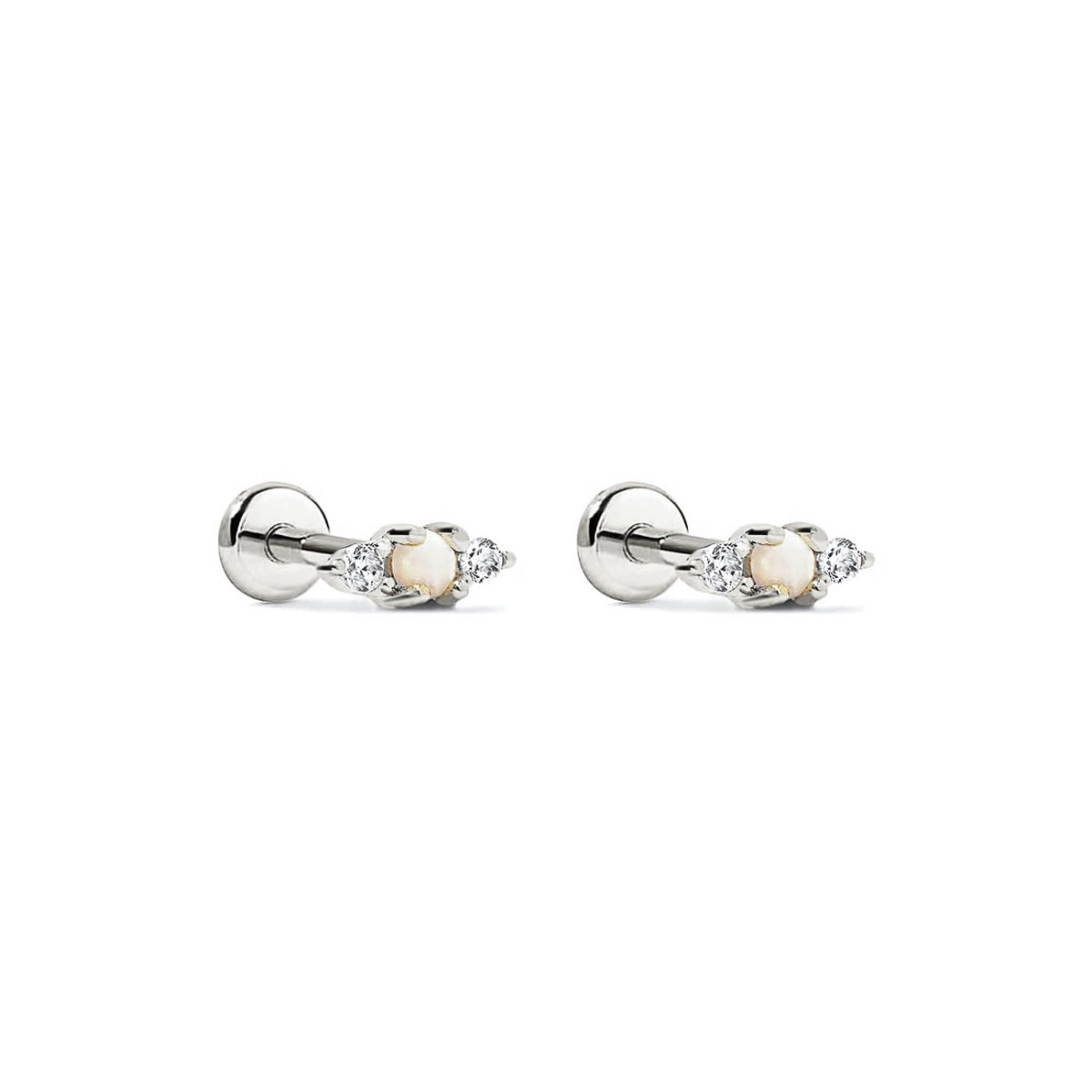 Pair of sterling silver flat back studs with a white opal and clear stones, on a white background