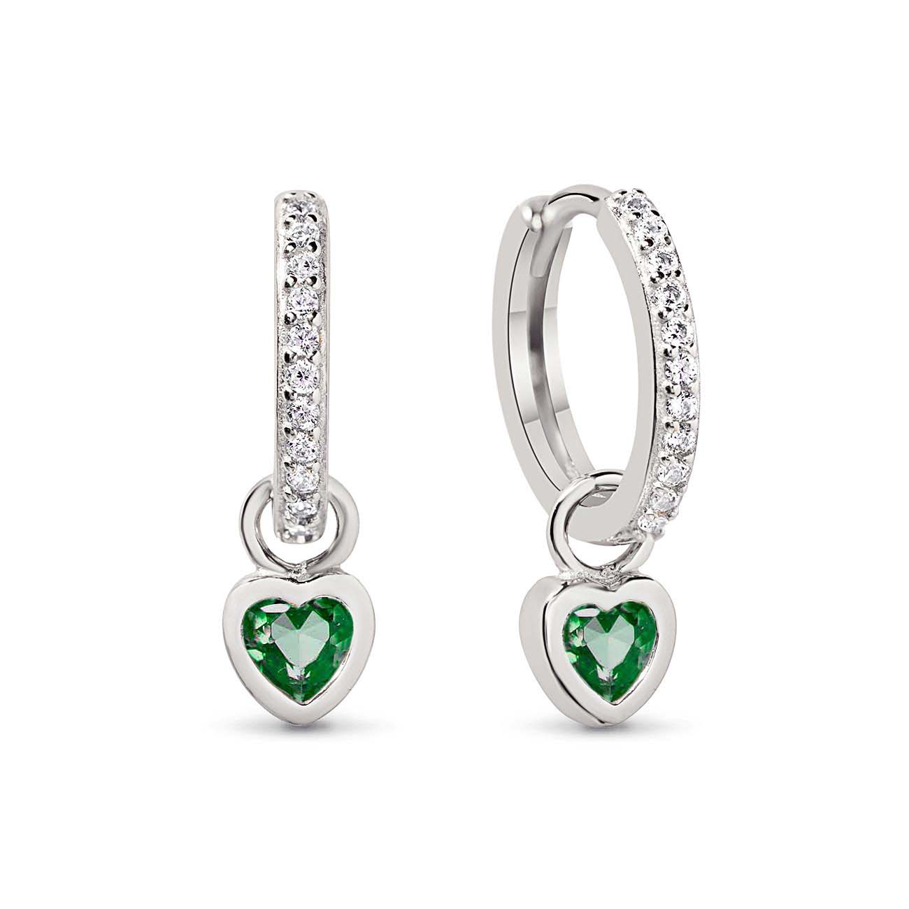 Sterling silver pavé huggie hoops with bezel-set heart-cut emerald charms, on a white background