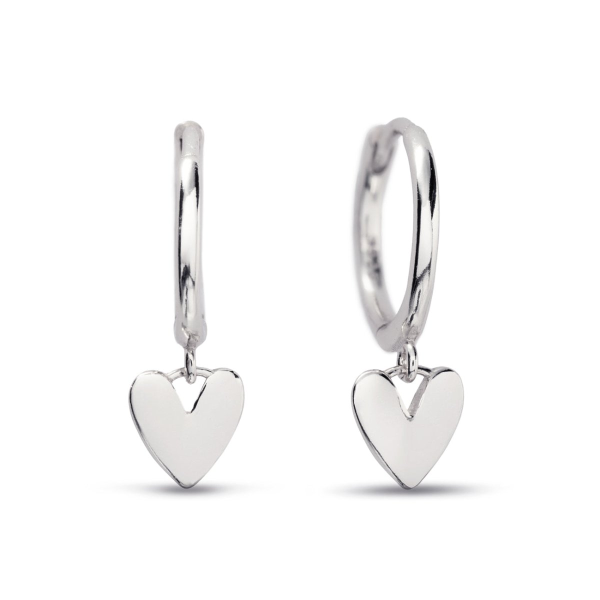 Sterling silver huggie hoops with small dangling heart charms, on a white background