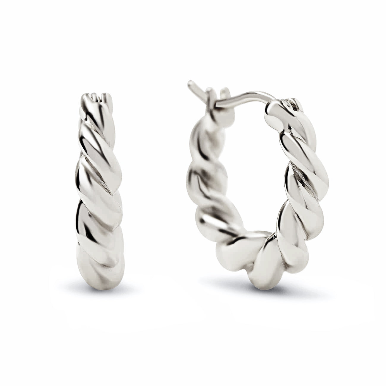 Pair of sterling silver thick twisted rope huggie hoops, on a white background