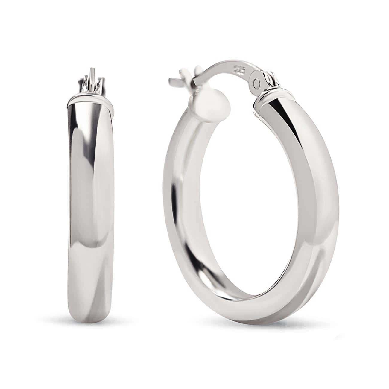 Sterling silver thick tube hoop earrings with a hinged closure, on a white background