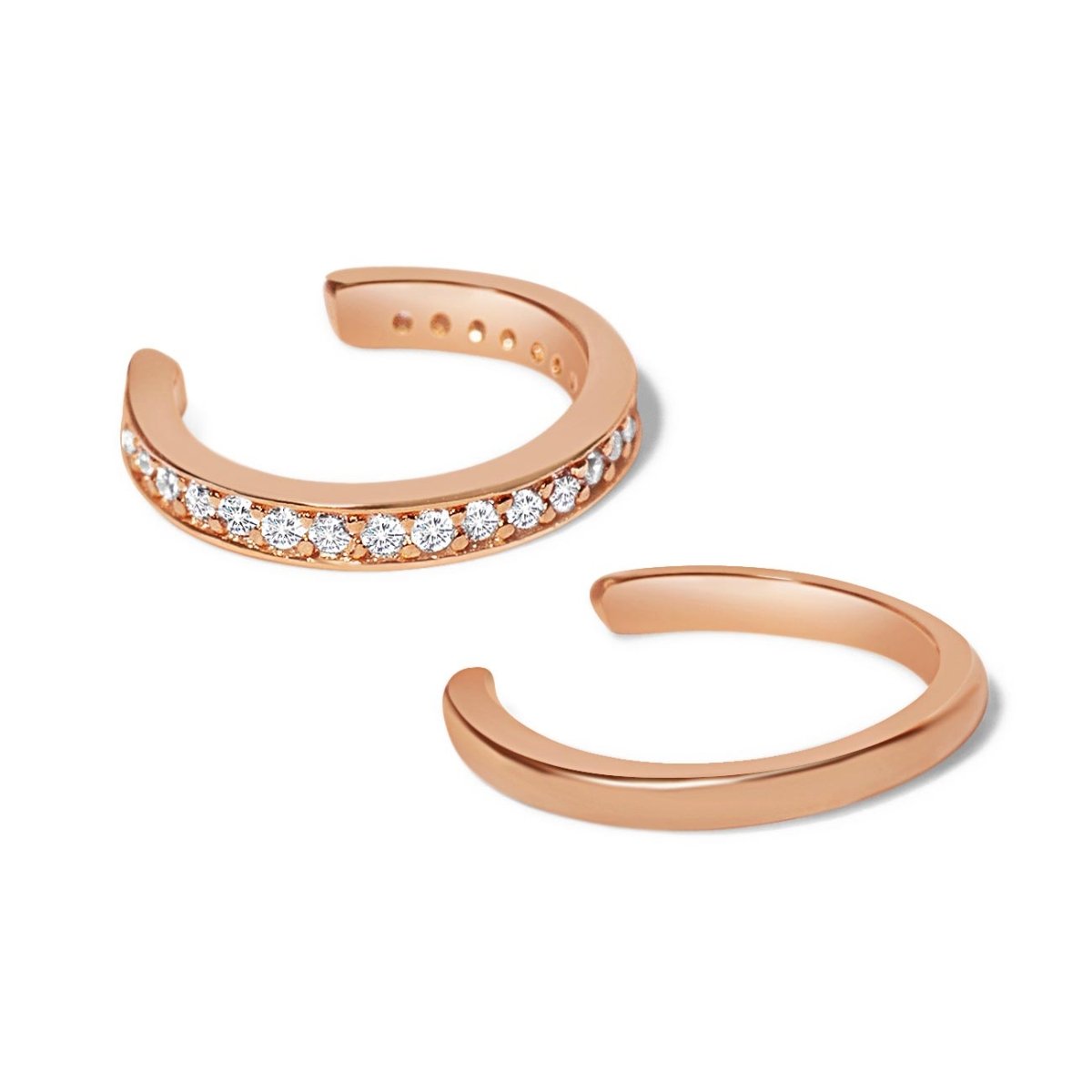 Rose gold vermeil ear cuff set, one pavé with clear stones and one plain band, on a white background