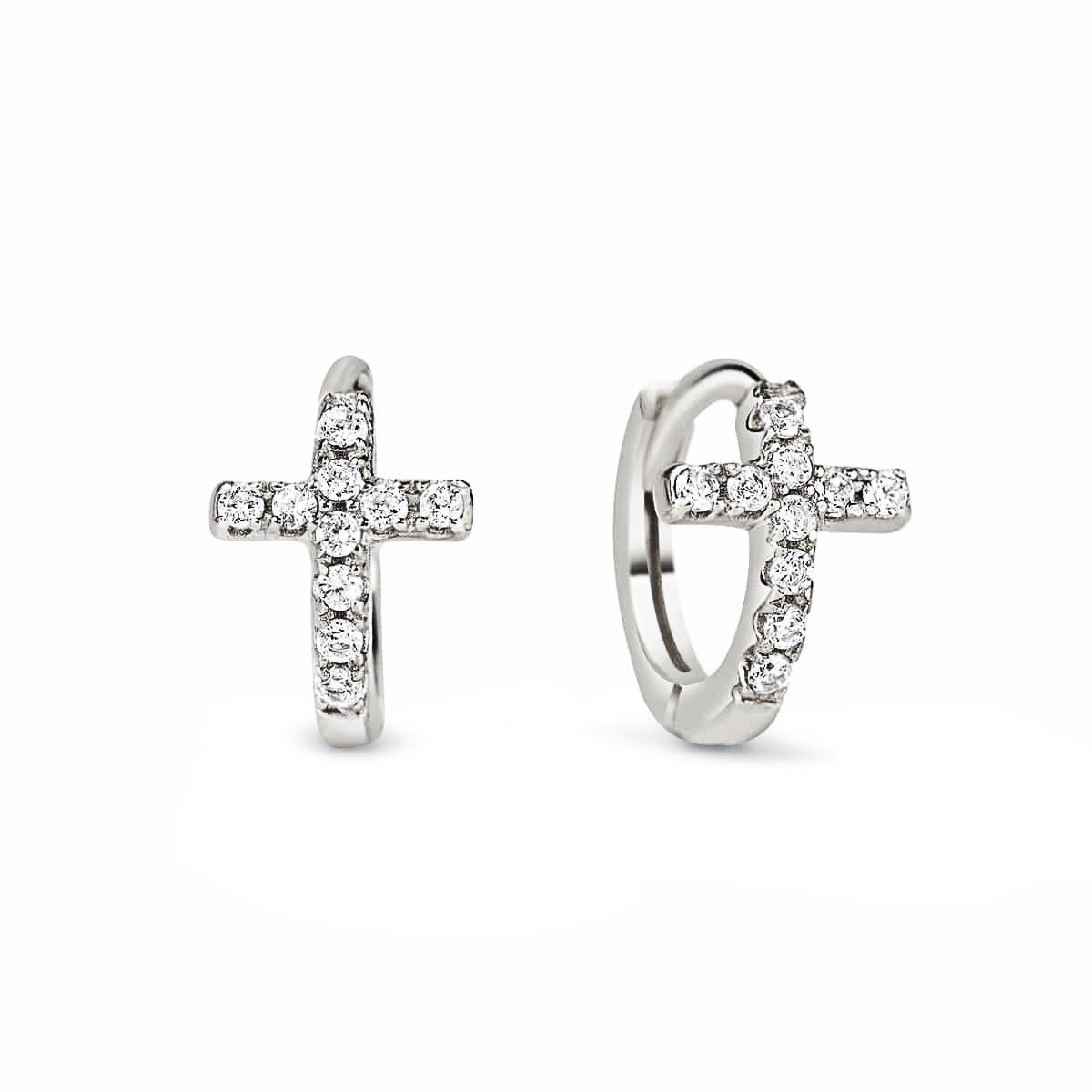 Sterling silver huggie hoops with pavé clear-crystal crosses, close-up detail on a white background