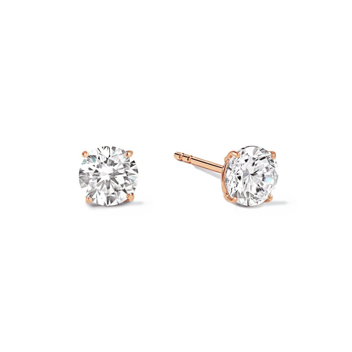 Pair of rose gold vermeil round zirconia solitaire studs in four-prong settings, on a white background
