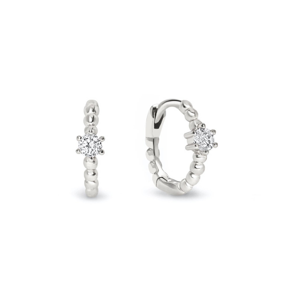 Sterling silver beaded huggie hoops with a white zirconia solitaire, on a white background