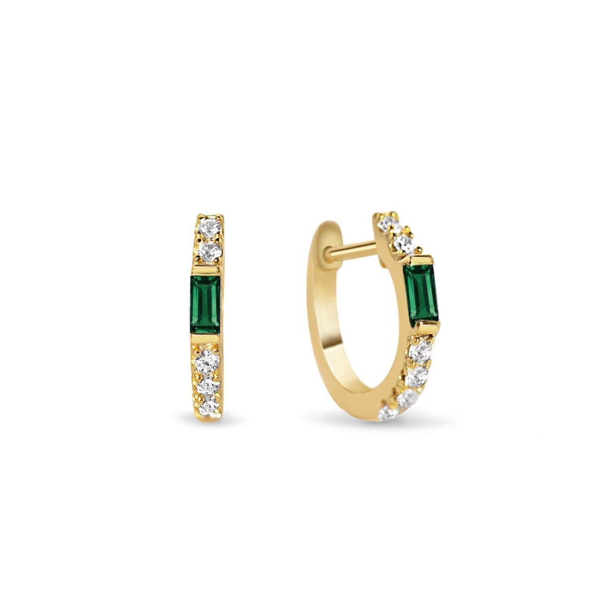 Gold vermeil baguette huggie hoops with an emerald baguette and white zirconia, on a white background