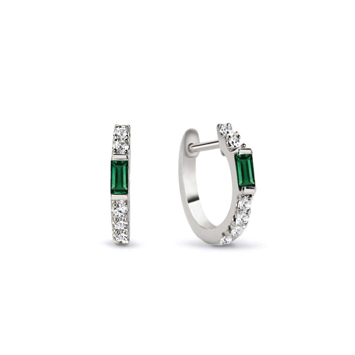 Sterling silver baguette huggie hoops with an emerald baguette and white zirconia, on a white background