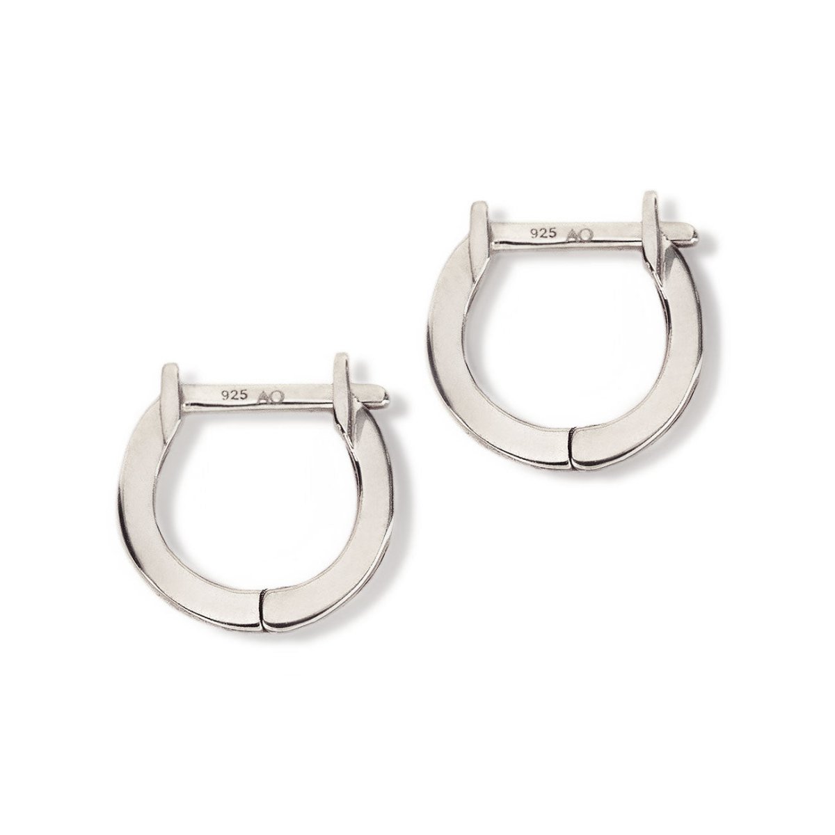 Pair of sterling silver plain huggie earrings with hinged closures, on a white background