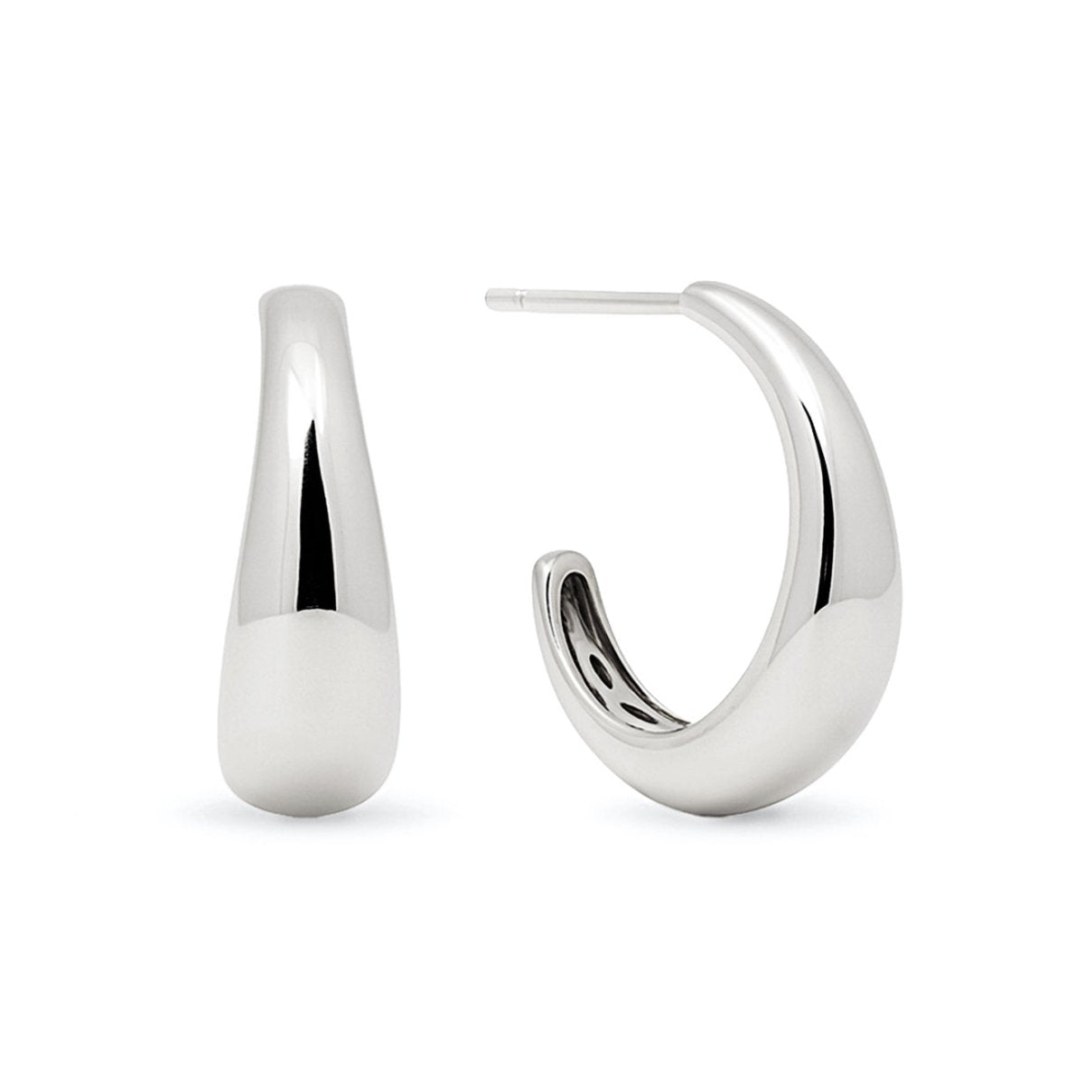 Sterling silver tapered C-shaped open hoop earrings on a white background