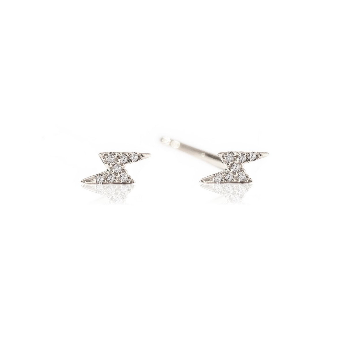 Pair of 14K white gold diamond pavé lightning bolt stud earrings on a white background