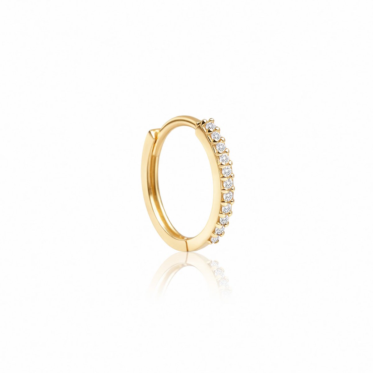 14K gold thin huggie hoop pavé-set with small round clear stones, on a white background