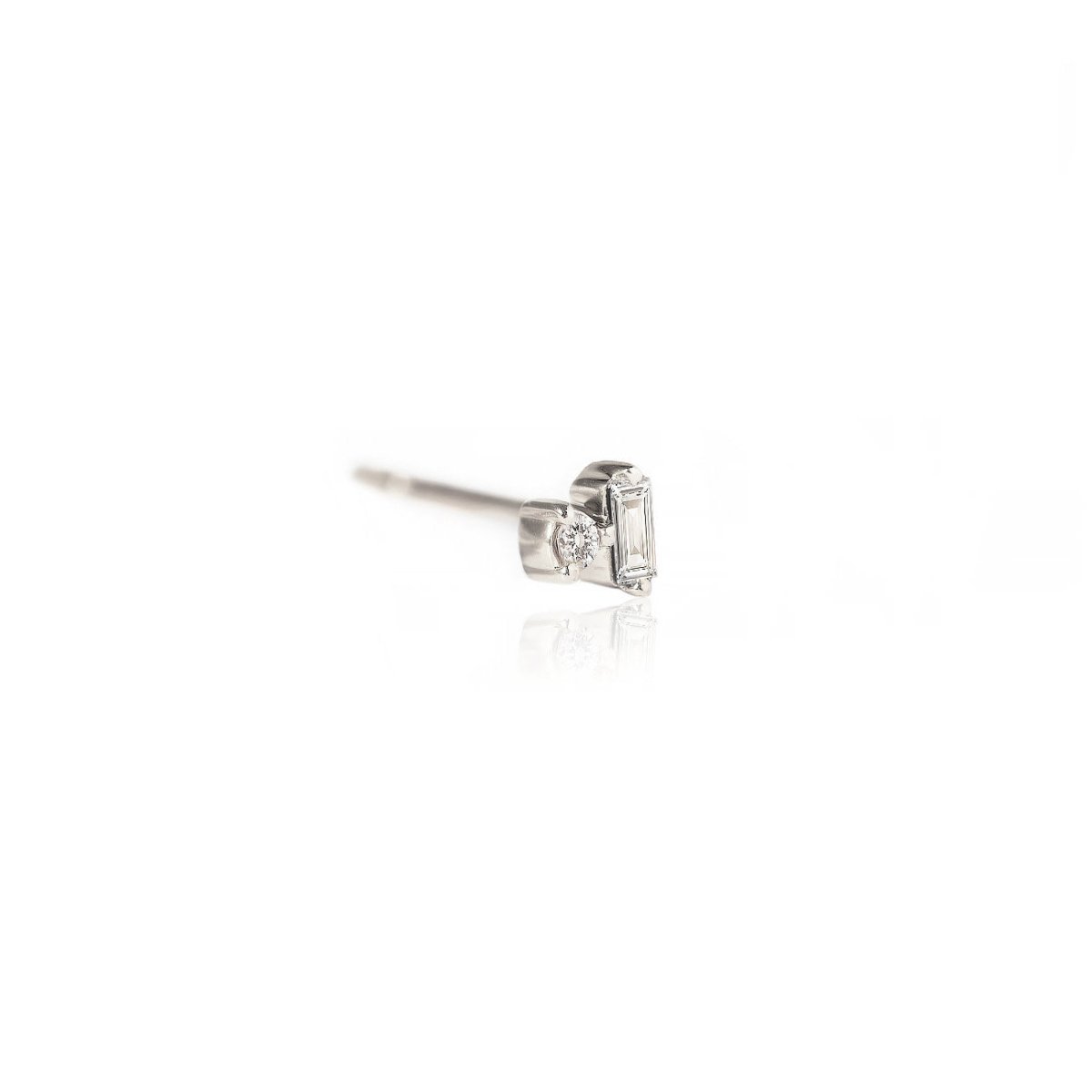 14K white gold stud with a baguette and round diamond, side view on a white background