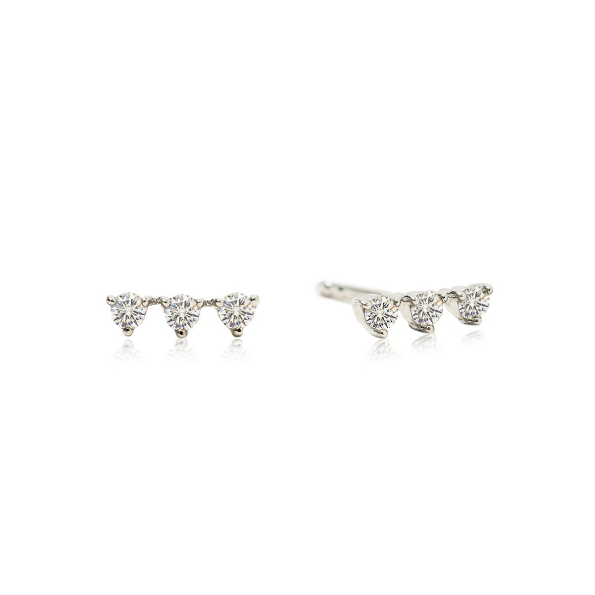 14K white gold bar studs with three round natural diamonds, on a white background