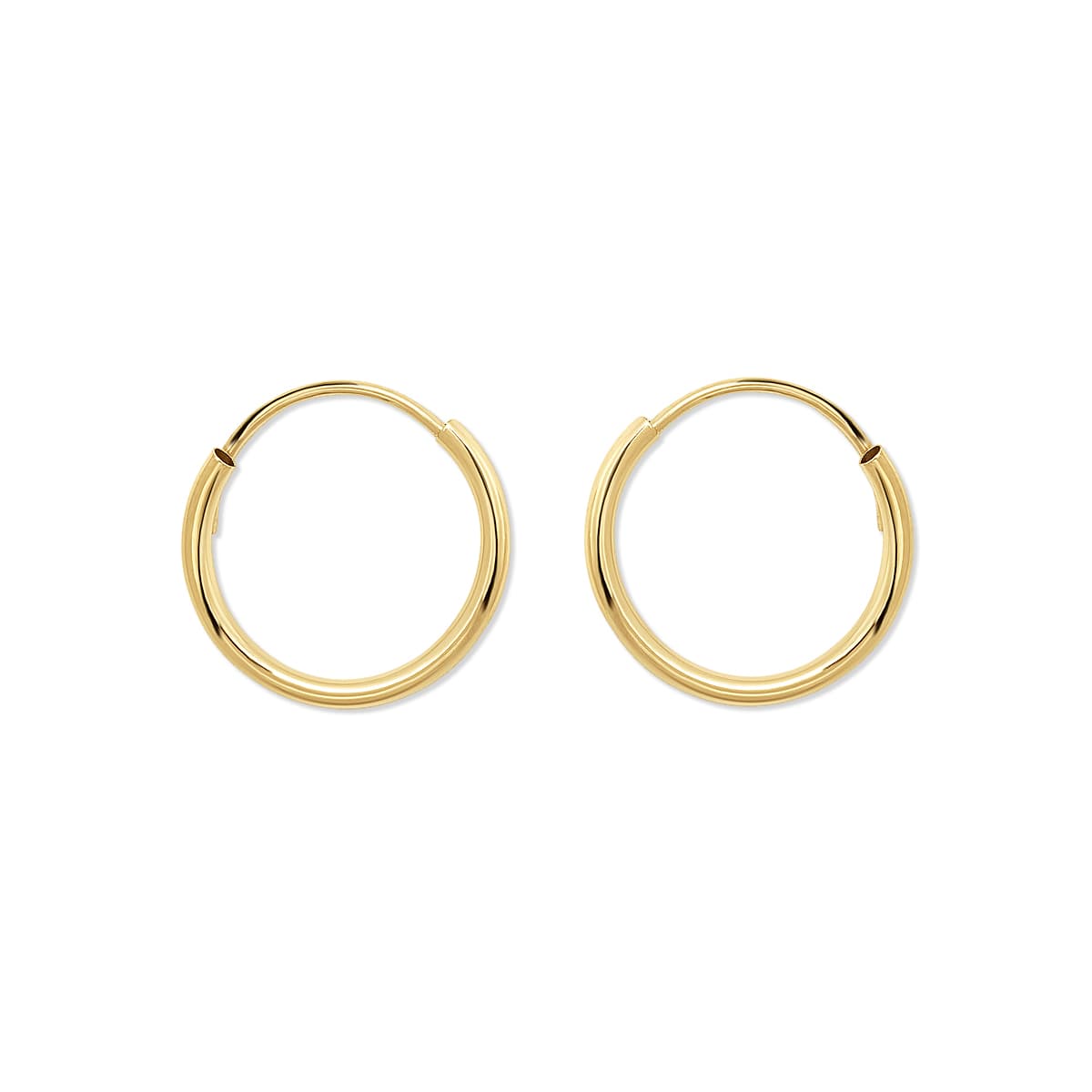 Pair of 14K gold thin huggie hoops with an endless tube closure, on a white background