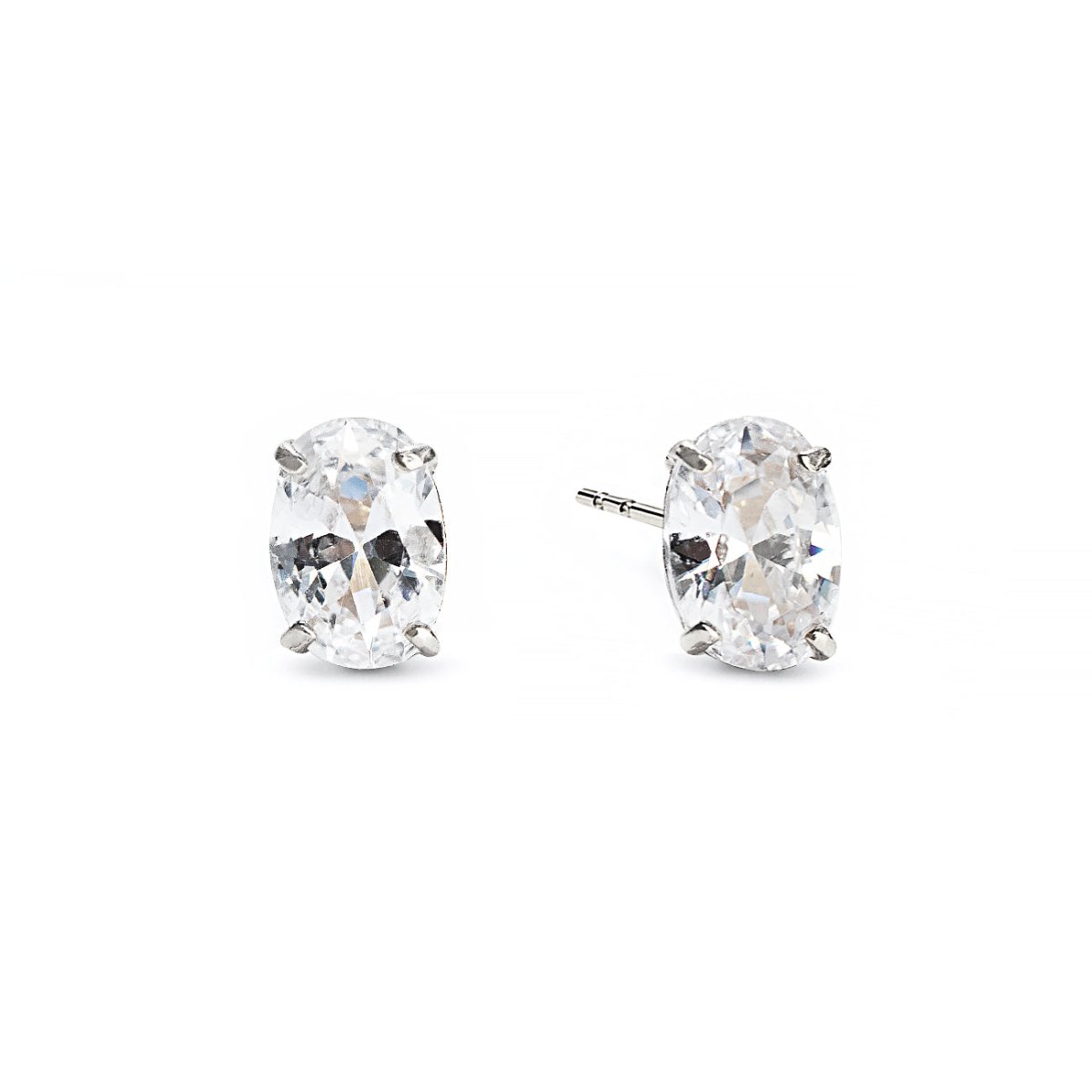 14K white gold oval zirconia stud earrings with clear prong-set stones, on a white background