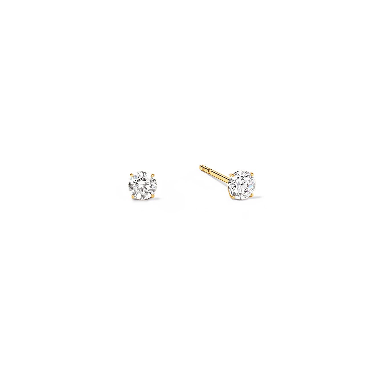 Pair of 14K gold solitaire studs with round clear white sapphires in prong settings, on a white background