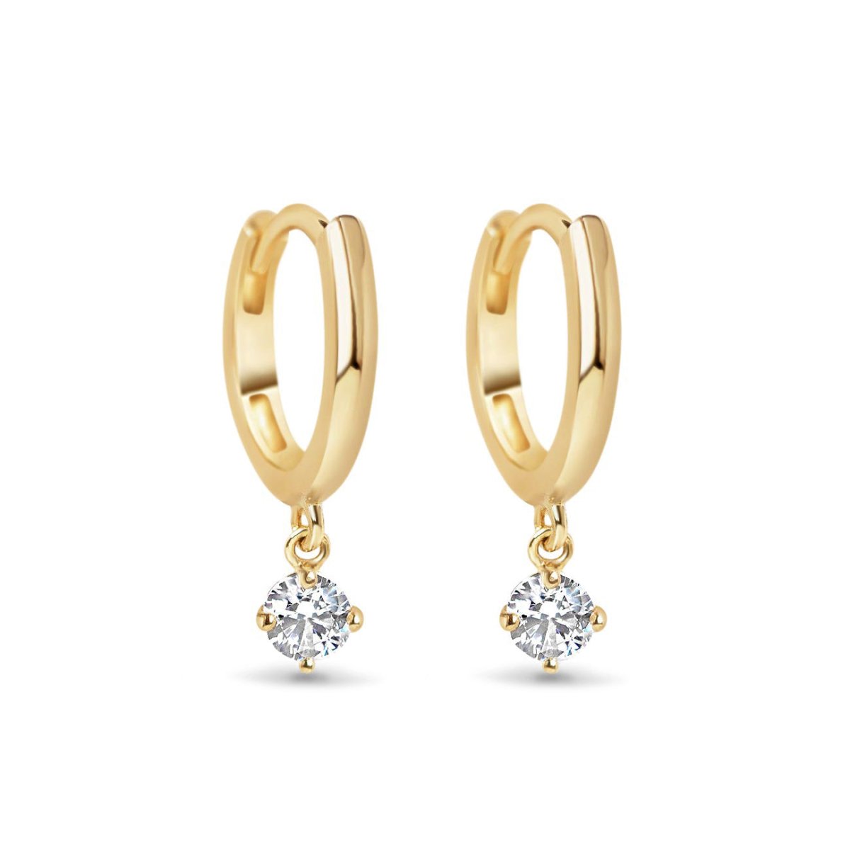 Pair of 14K gold huggie hoops with a round moissanite dangle, on a white background