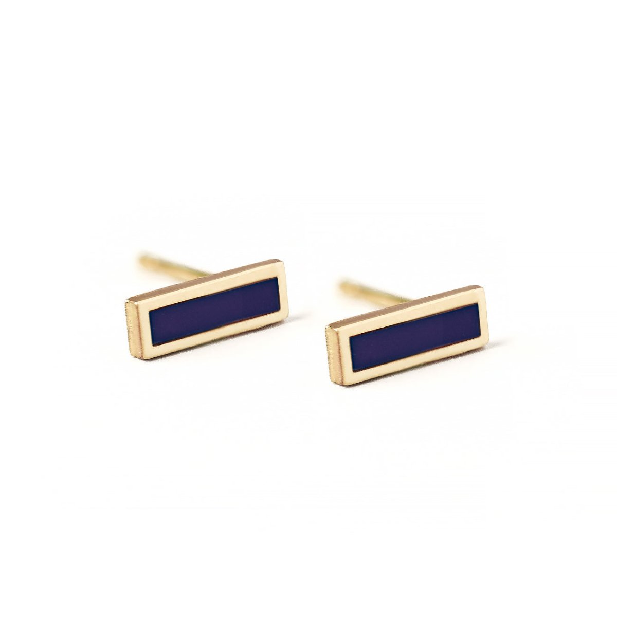 Pair of 14K gold lapis lazuli bar studs with deep blue rectangular stones, on a white background