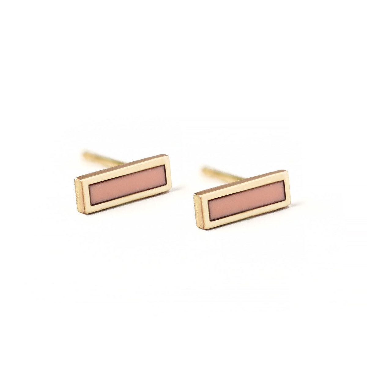 Pair of 14K gold rose quartz bar studs with pale pink rectangular stones, on a white background