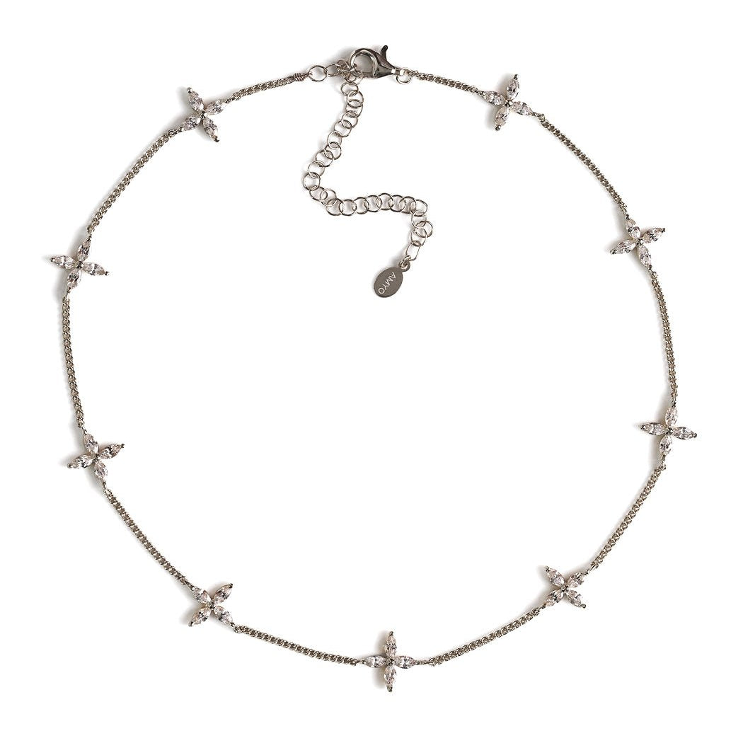 Sterling silver choker with marquise clear crystal flower stations and a lobster clasp, on a white background