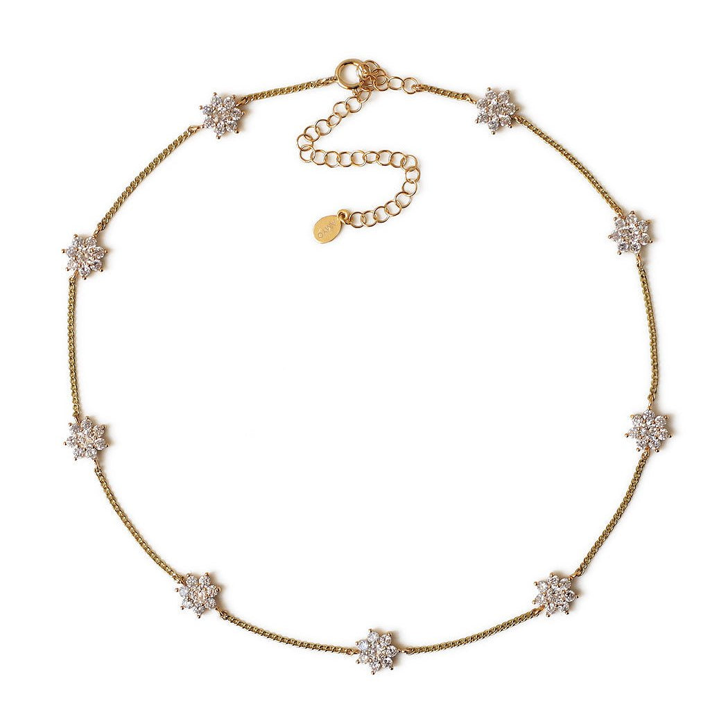 Gold vermeil choker with clear crystal flower stations and an adjustable chain, on a white background