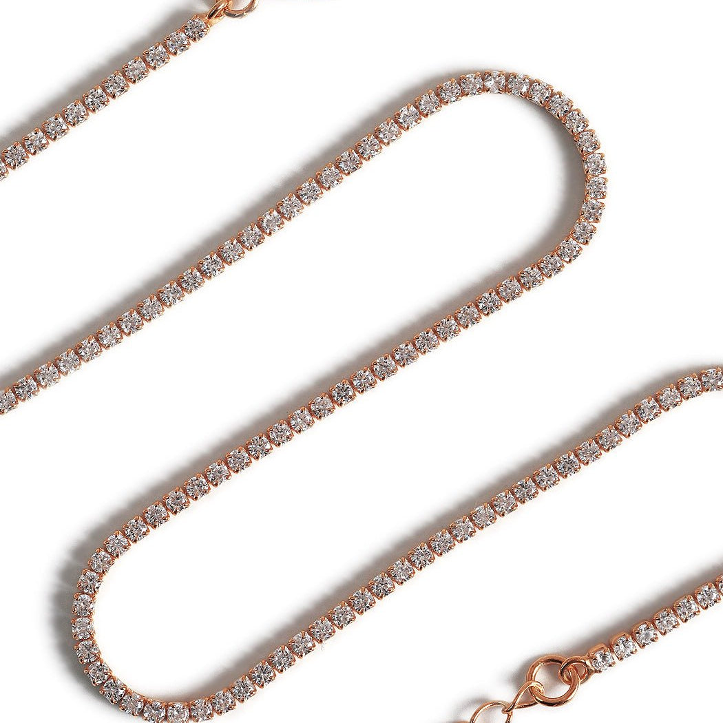 Rose gold vermeil crystal choker, close-up detail of the round clear stones, on a white background