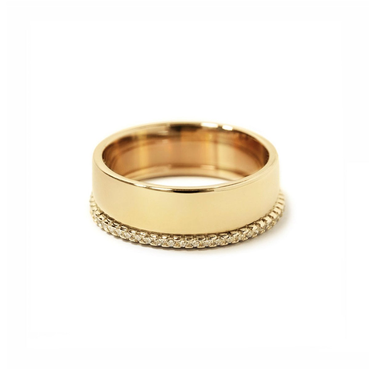 Gold vermeil ring set, a wide band paired with a pavé white zirconia band, on a white background