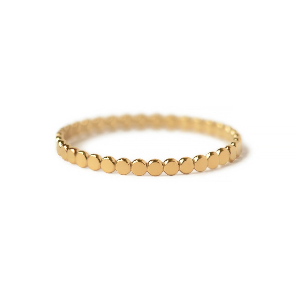 Gold-filled flat beaded band ring, on a white background