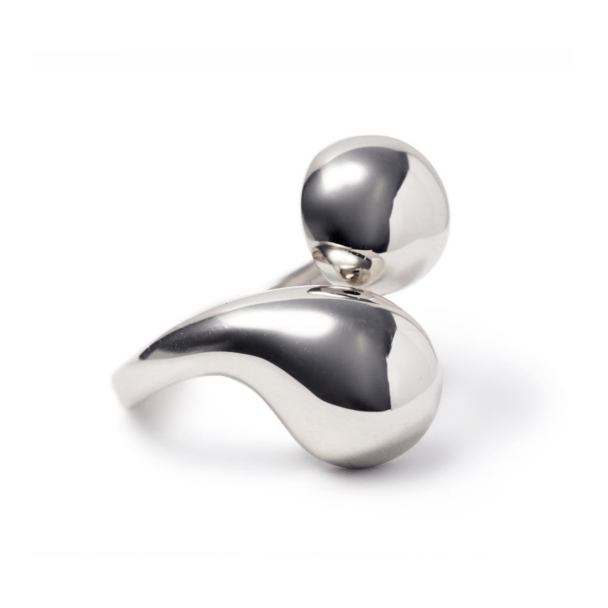 Sterling silver sculptural bypass ring, on a white background