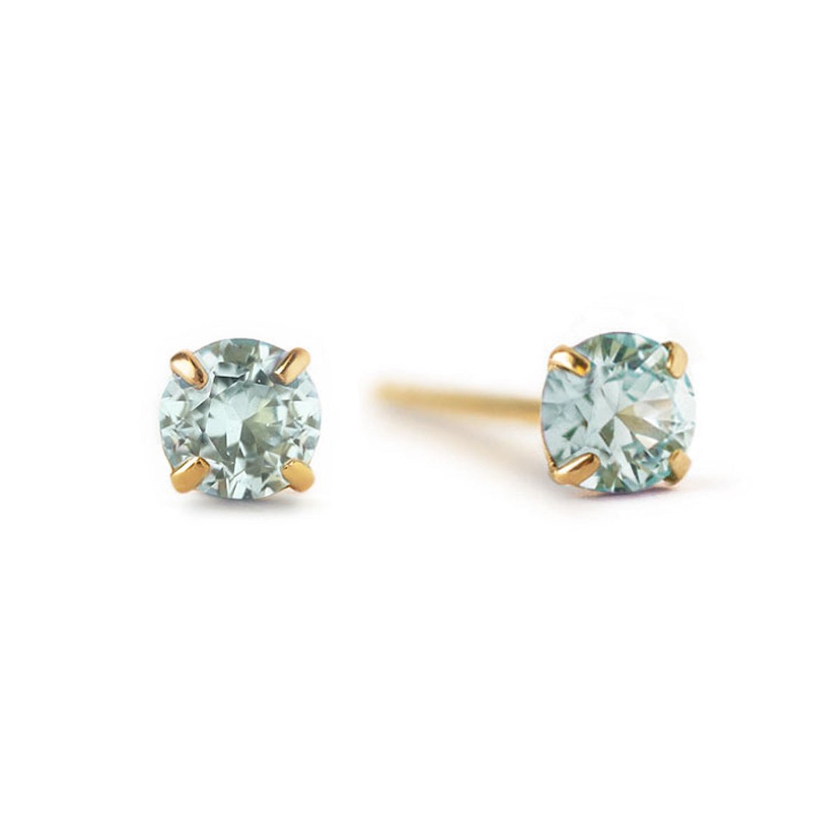 14K gold prong-set aquamarine stud earrings with round pale blue stones, on a white background
