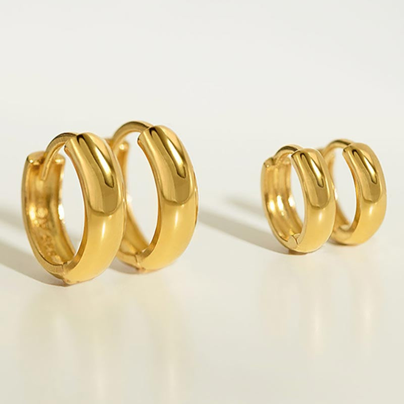 Chunky gold huggie hoop earrings in two sizes